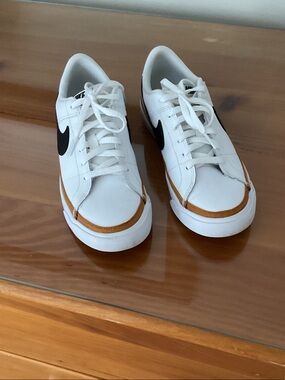 Nike White Leather Sneakers with Black Swoosh and Tan Trim